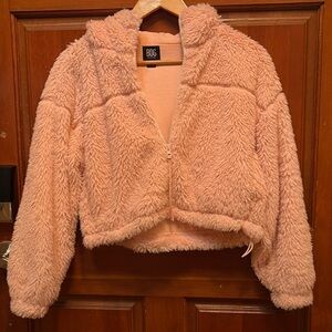 Urban Outfitters pink zip up crop jacket. Size S-P.
